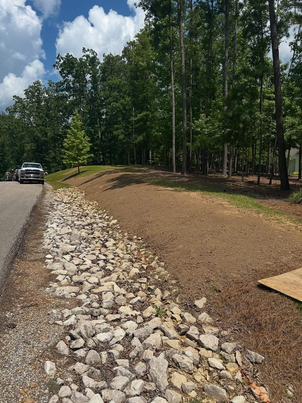 Rock drainage swale installation, Birmingham AL