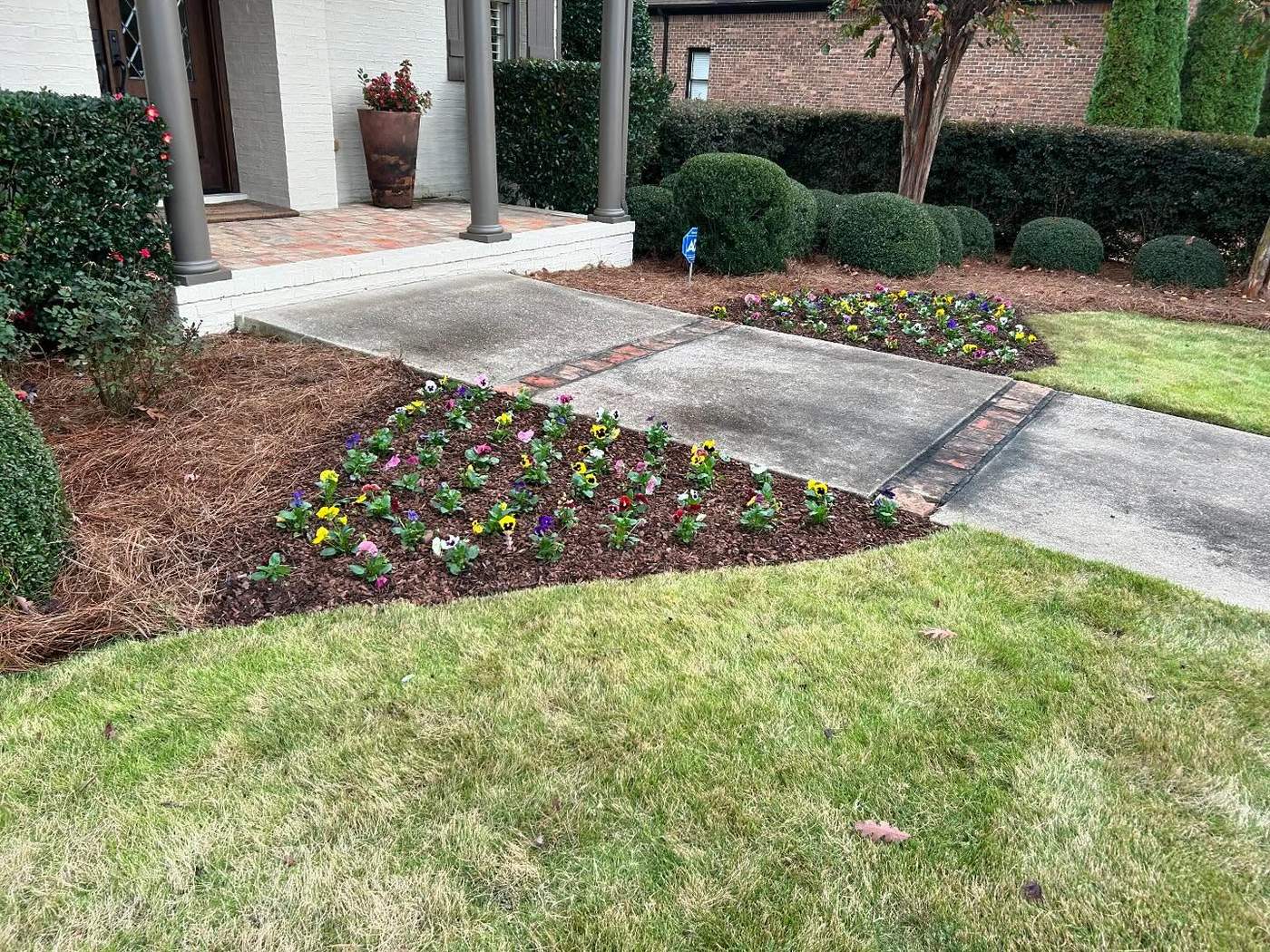Mulch bed installed at a Homewood-area home entryway