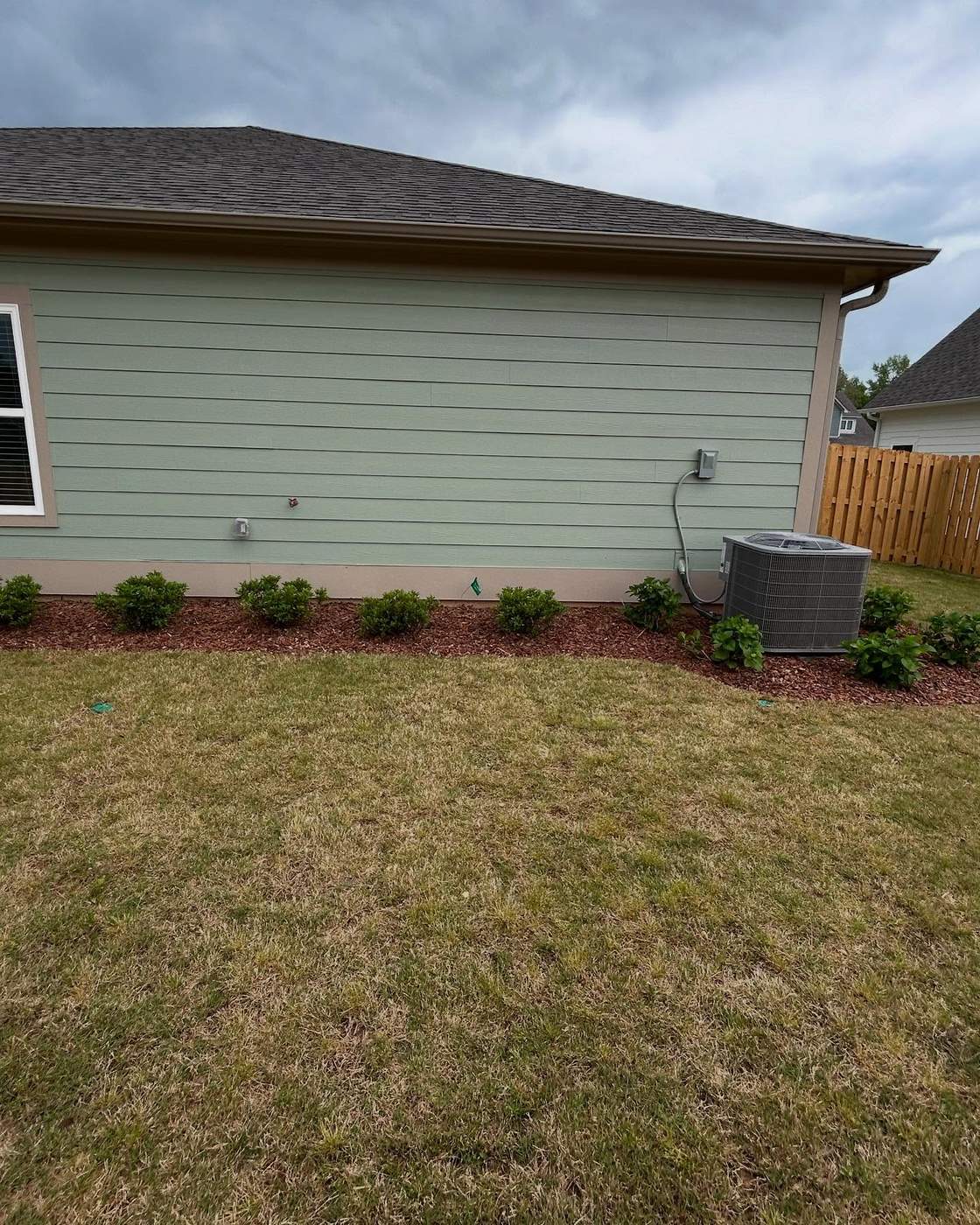 Fresh sod installed around a new landscape bed, Birmingham AL