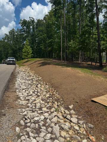 Rock drainage swale installation &mdash; SOG Services, Birmingham AL